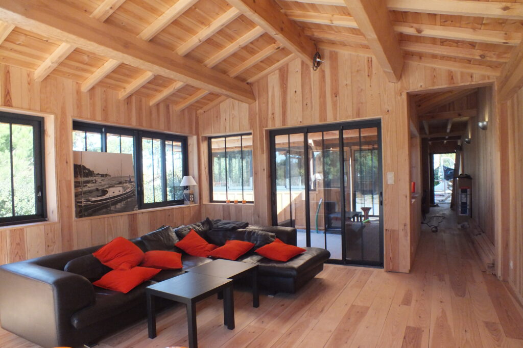 Maisons neuves 8 vue du salon vers patio extérieur